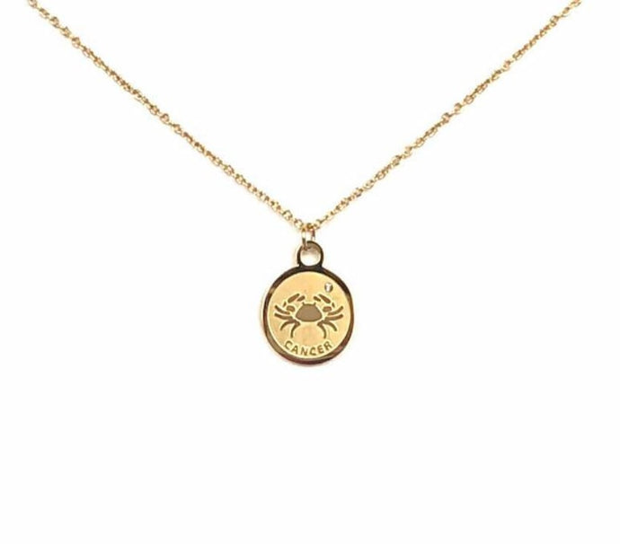 Front of a gold Cancer Medallion ( a Crab-like symbol)Necklace 