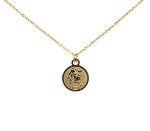 The front side of a gold Leo Medallion Necklace on a white background.