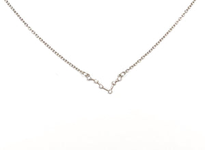 A Silver Pisces Zodiac Constellation Necklace is on a white background. 