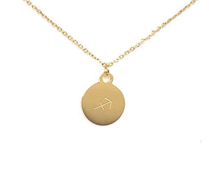 A Sagittarius symbol which is on The back side of a gold Sagittarius Zodiac Sign Coin is on a white background.