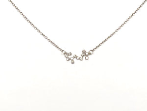 A silver Scorpio Zodiac Constellation Necklace is on a white background. 