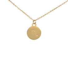 Load image into Gallery viewer, The back side of a Scorpio Gold Zodiac Coin that features a M-like symbol is on a white background. 
