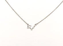 Load image into Gallery viewer, A silver Taurus Zodiac Constellation Necklace is on a white background. 
