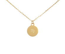 Load image into Gallery viewer, The back side of a gold Virgo Zodiac Coin Necklace on a white background. 
